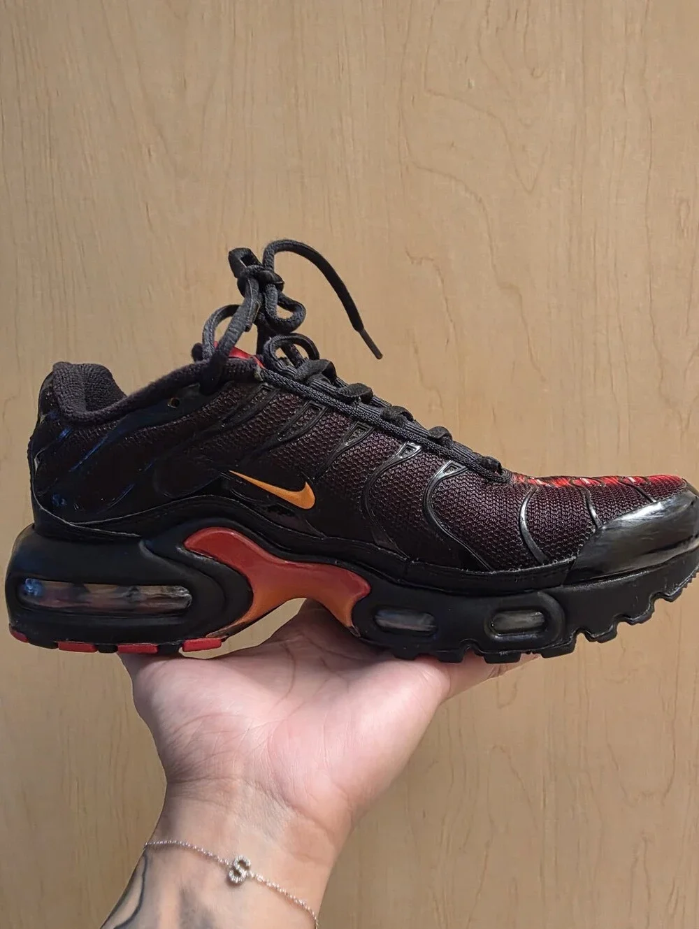Nike Air Max Plus Black with Red and Yellow Accents